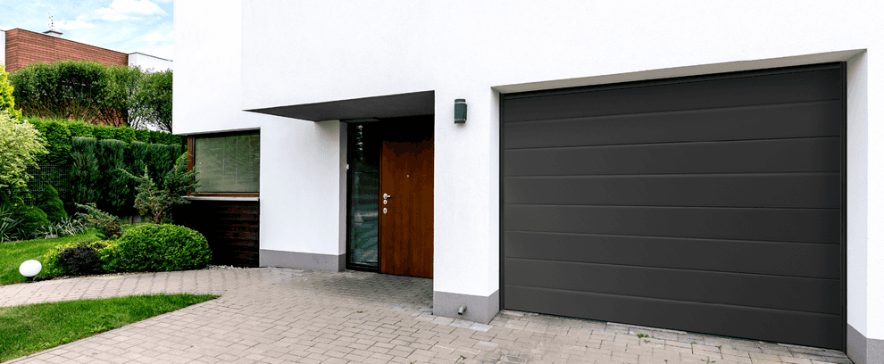 Smart overhead sectional door Trend in grey aluminum